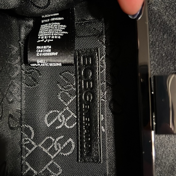 NWOT BCBGeneration Cocktail Purse. Black & Silver sequins with 24” strap. - Picture 6 of 7